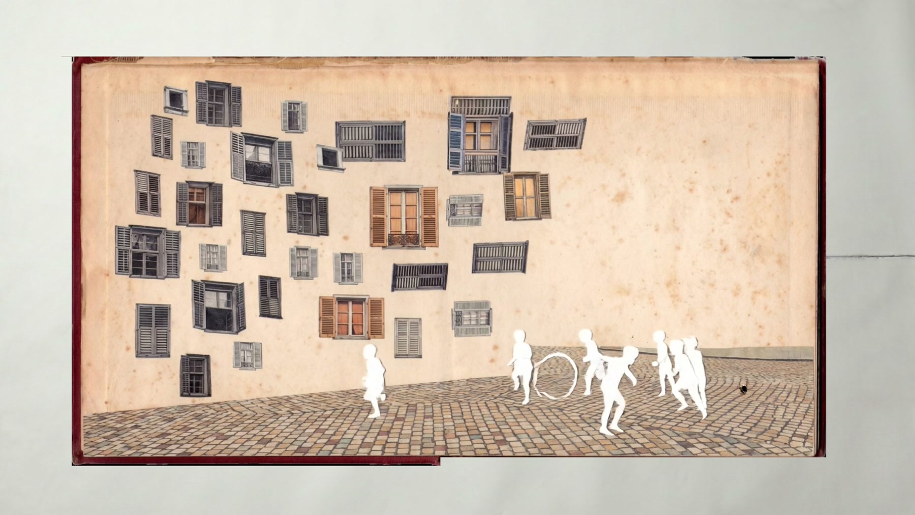 Film still: small white figures walking beneath a rising cloud of dark windows and doors
