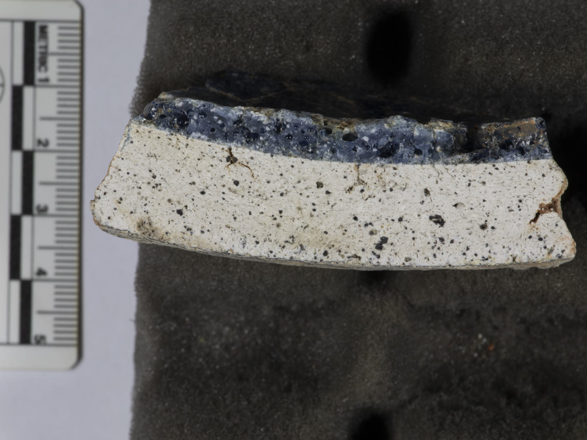 Cross-section of an Ile-Ife crucible showing a layer of blue glass