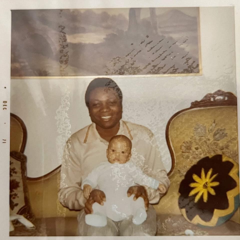 A 1971 family photograph of Fred Kuwornu as a baby held by his father