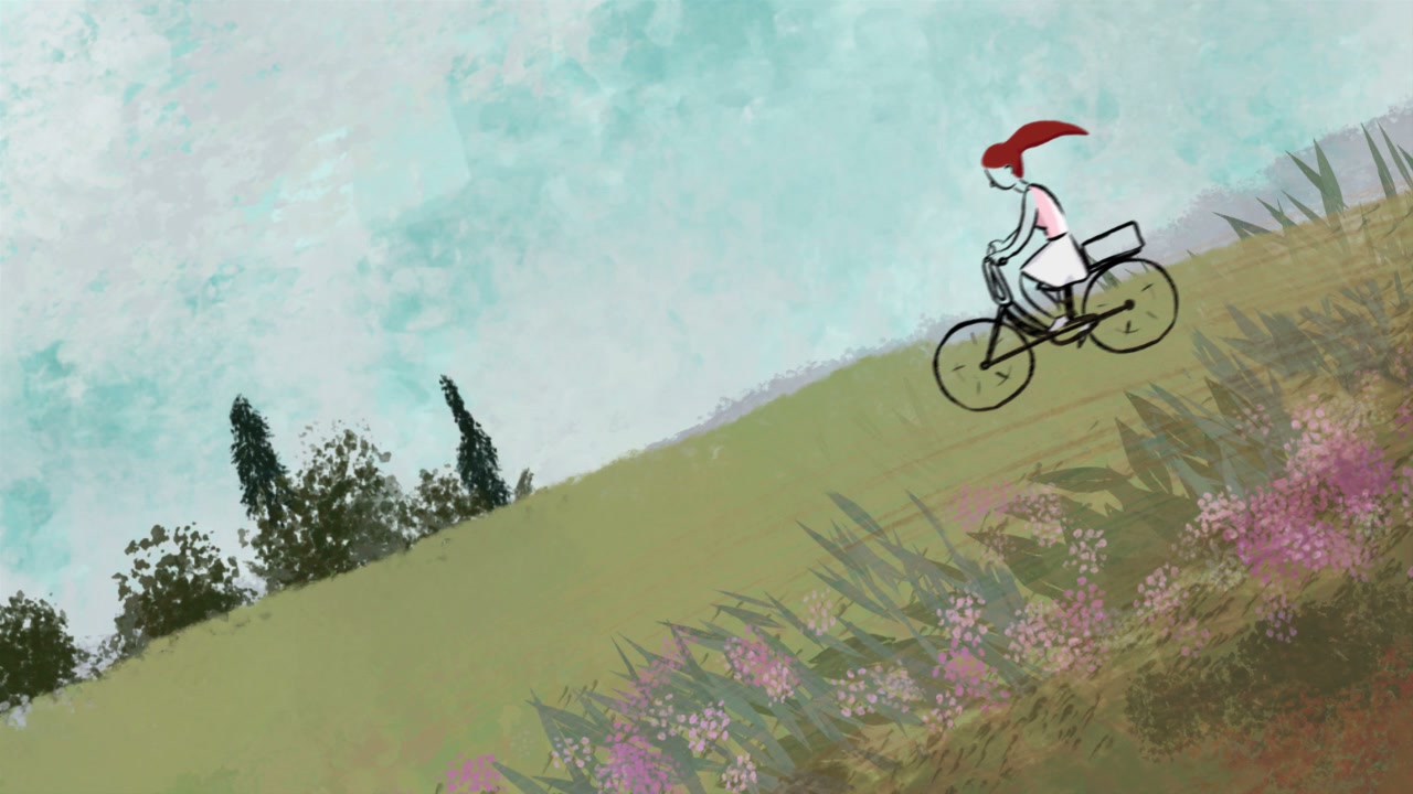 A lone rider with a red headscarf on a flowering hillside